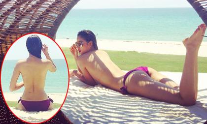 Phạm Hương táo bạo 'quên' mặc áo bikini khi tắm nắng trên biển