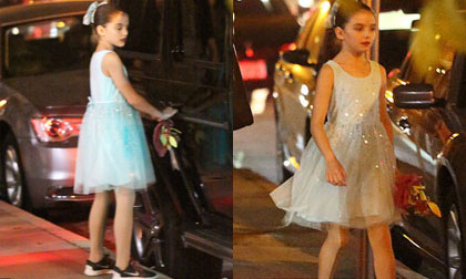 Suri mặc váy xinh như công chúa xuất hiện trên phố lúc đêm muộn