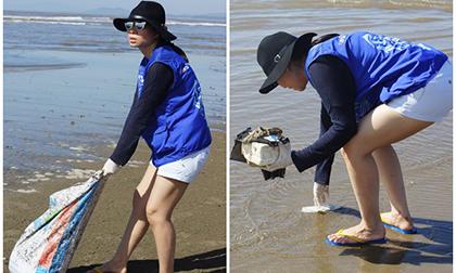 Thu Minh giản dị, không ngại bẩn đi dọn rác ở bãi biển