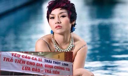  Ca sĩ Thái Thùy Linh bị treo băng rôn đòi nợ