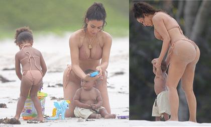 Thân hình đồng hồ cát ấn tượng của Kim Kardashian trong bộ bikini hồng