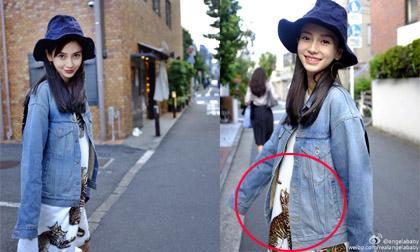 Mặc váy rộng, Angela Baby vẫn không giấu nổi bụng bầu lớn