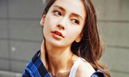 'Gái một con' Angela Baby sành điệu và tươi trẻ xuống phố