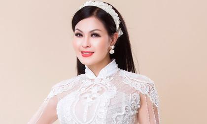 Ca sĩ Yến Vy duyên dáng trong trang phục áo dài đính kết cầu kỳ