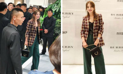 Xuất hiện với dàn vệ sĩ 'khủng', Triệu Vy sành điệu nhanh chóng trở thành tâm điểm chú ý