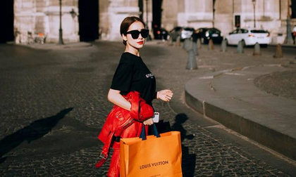 Hòa Minzy 'tay xách nách mang' với loạt đồ hiệu mới trên đường phố Paris