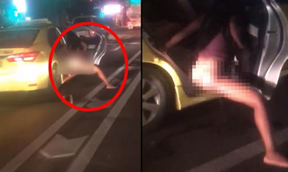 Tranh thủ lúc dừng đèn đỏ, cô gái thò chân xuống ô tô và làm một việc không ai ngờ tới