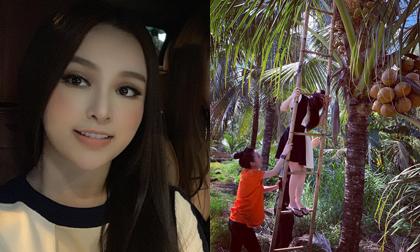 Huyền Baby trổ tài leo thang hái dừa, song bộ váy cô mặc mới là điều khiến dân tình không rời mắt