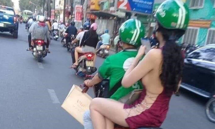 Cô gái trẻ diện váy cắt xẻ táo bạo, khoe vòng một hững hờ giữa phố đông nhưng anh tài xế Grab mới là người bị réo tên