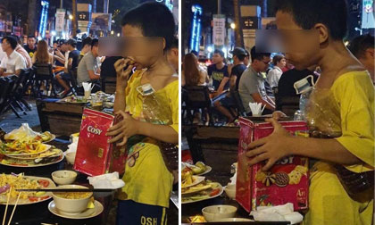 Cảnh cậu bé nhặt nhạnh đồ thừa ăn ngấu nghiến giữa phố Sài Gòn khiến nhiều người xót xa