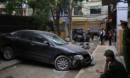 Vụ nữ tài xế lùi Camry cán chết người đi xe máy trên phố Hà Nội: Hiện trường ám ảnh