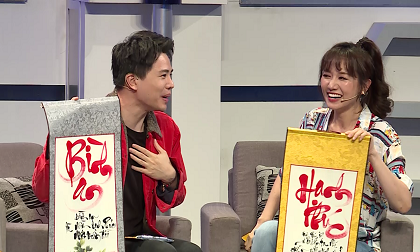 Hari Won thích thú khi được cậu bé viết thư pháp “tặng chữ” cho mình và Trịnh Thăng Bình