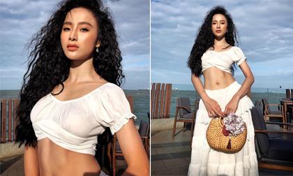 Thoát xác khỏi những bộ đồ 'kín cổng cao tường', Angela Phương Trinh trở lại cực gợi cảm