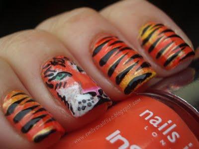 Vẽ nail con hổ tinh nghịch cho cô nàng cá tính