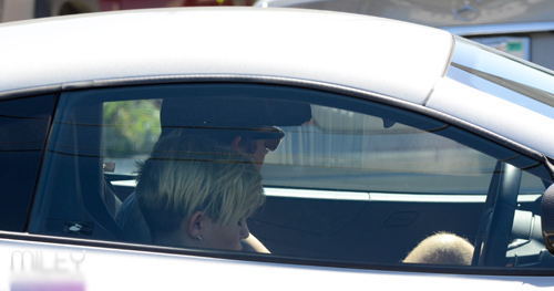 Miley Cyrus,McLaren MP4-12C,Liam Hemsworth