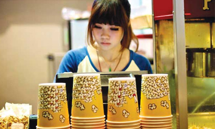 bắp rang bơ, tại sao bắp rang bơ thành 'món ăn vua' ở tất cả các rạp chiếu phim, nguồn gốc bắp rang bơ ra đời