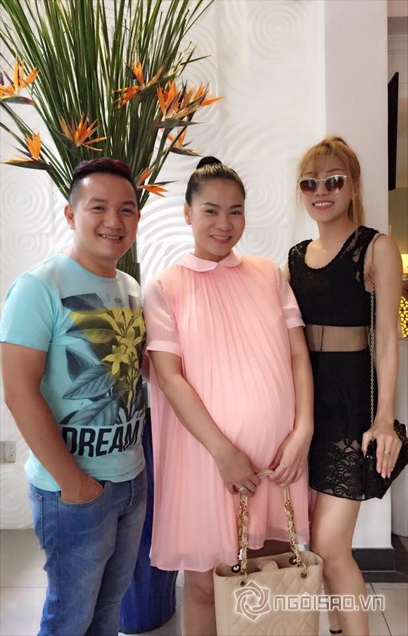 Thu minh,ca si thu minh,giam khao vietnam idol thu minh,thu minh khoe bung bau