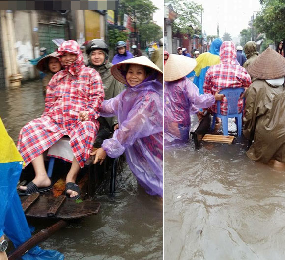 Hà Nội đường biến thành sông,Hà nội ngập lụt,Hà Nội ngập sau mưa to,bà bầu đi đẻ bằng xe cải tiến