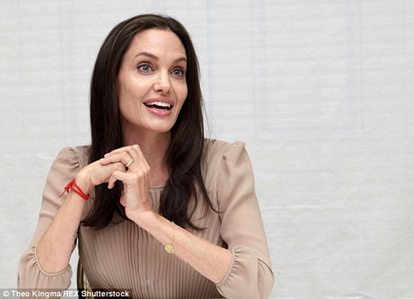 Angelina Jolie,Angelina Jolie confidently lets loose,Angelina Jolie had her breasts removed,Angelina Jolie had soft tissue breast reconstruction,Angelina Jolie appeared at the event,Hollywood stars